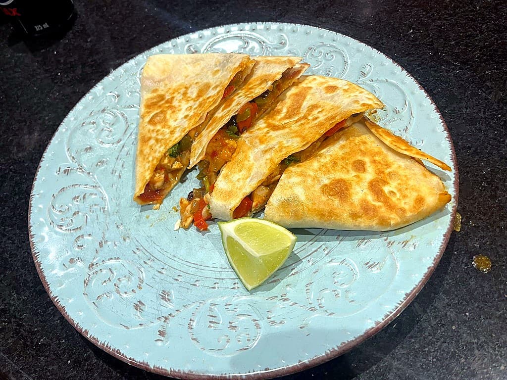 A golden quesadilla made by a PMOS Trainers client